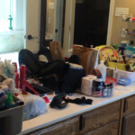 cluttered bathroom vanity